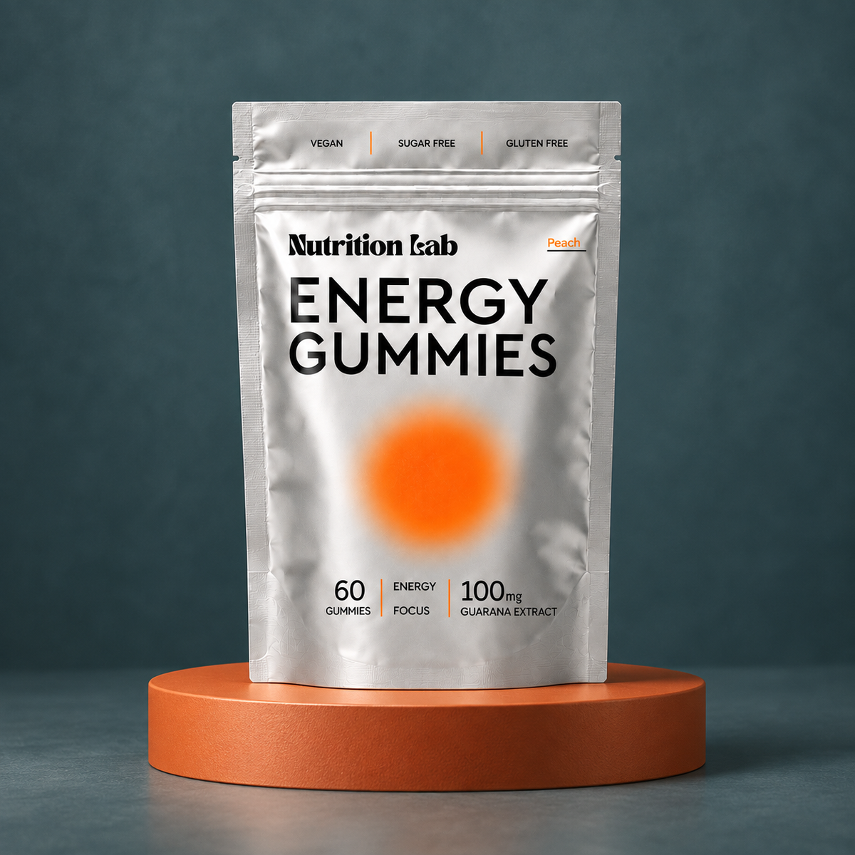 Silver Energy Gummies peach pouch on an orange plinth against a deep teal background.